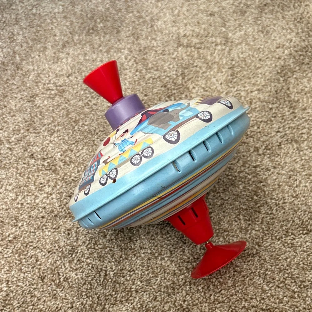 Moulin roty toddler Carnival Print Spinning Top Toy slighlty broken still works